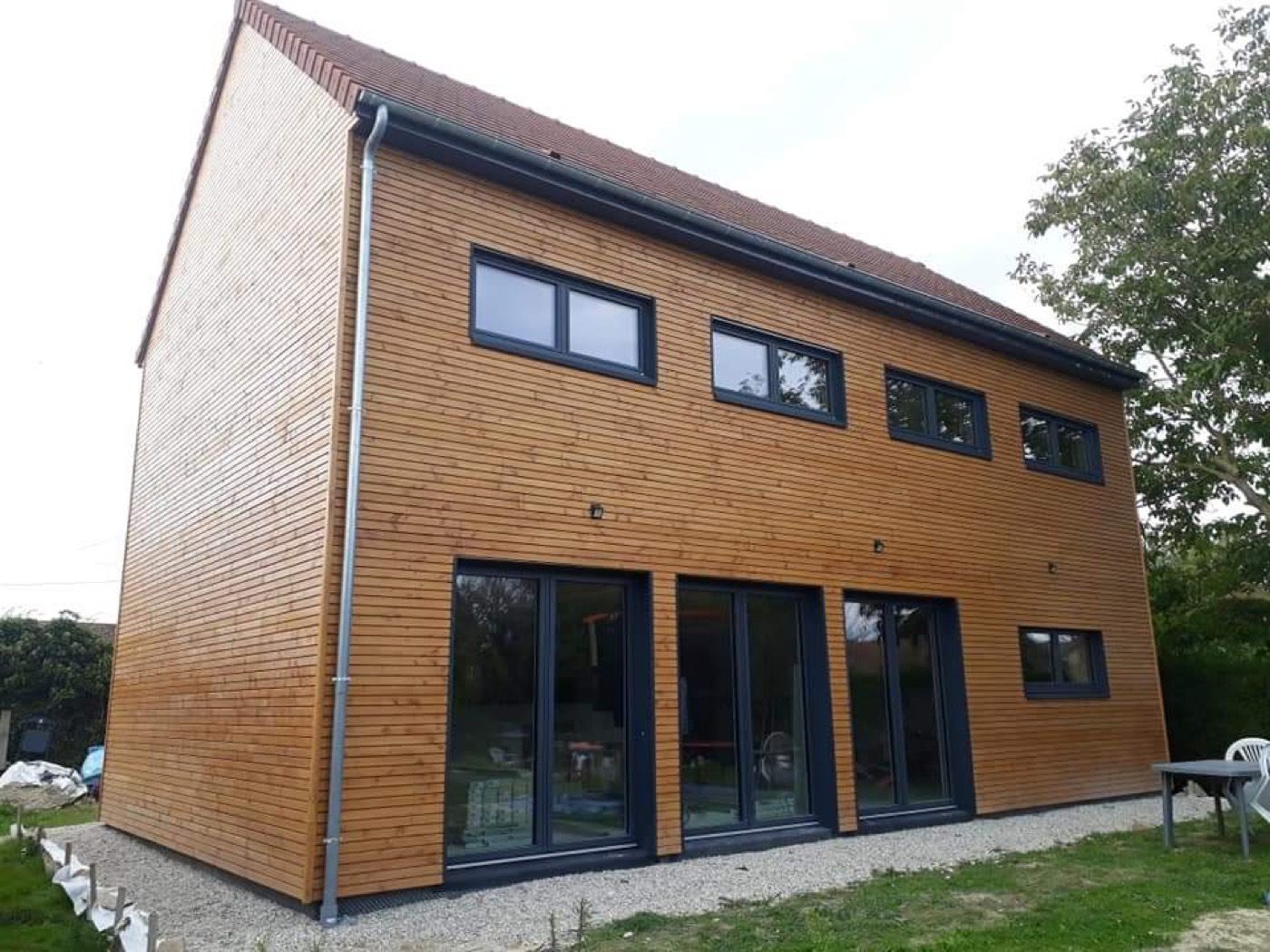 Construction d'une maison à bardage bois, réalisation Bati M2G