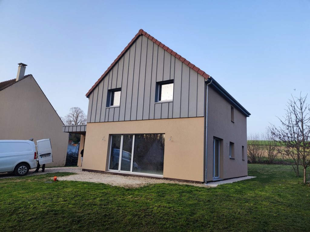 Construction d'une maison ossature bois à toiture zinc par Bati M2G
