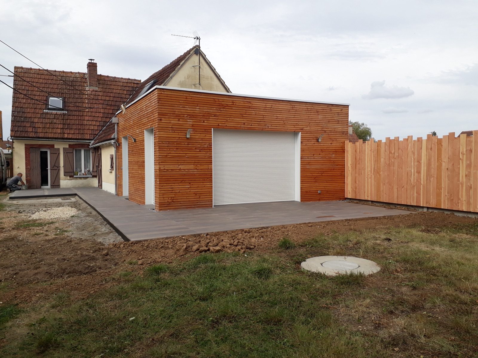 Extension bois avec garage intégré, réalisation Bati M2G